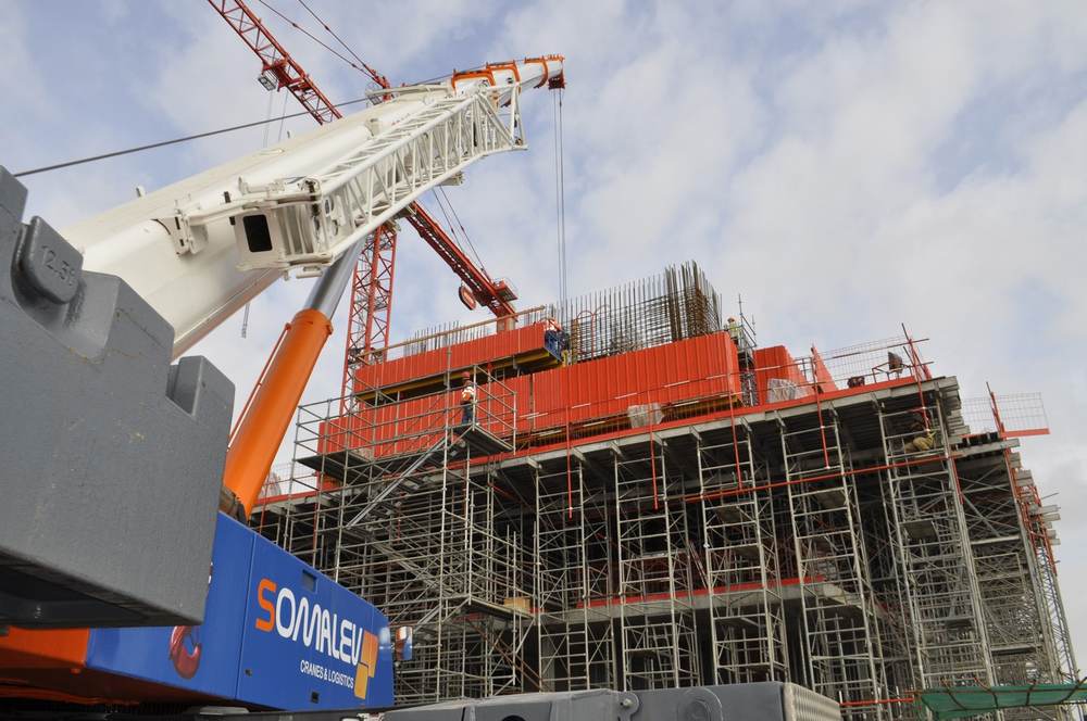 SOMALEV mobile crane lifting a structure on a construction site